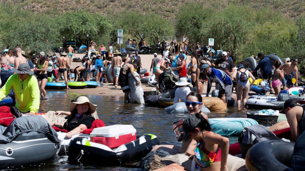 PHOTO: People prepare to go tubing on Salt River amid the outbreak of the coronavirus disease (COVID-19) in Arizona, June 27, 2020.