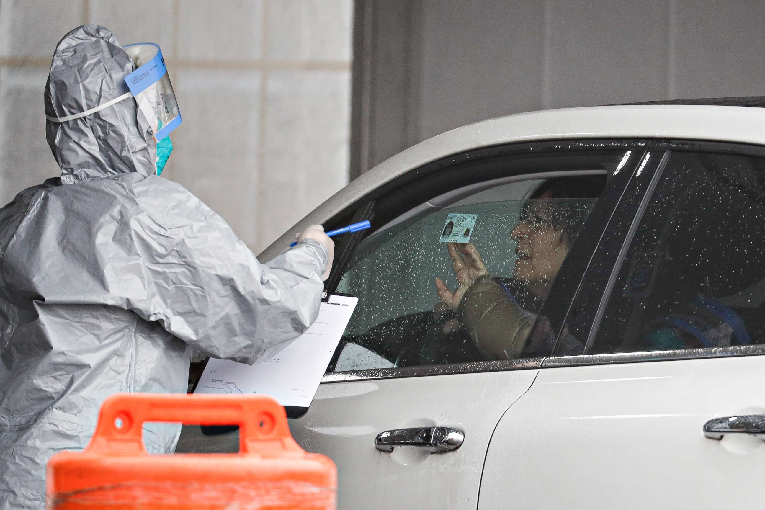 PHOTO: A driver arrives to be tested for the coronavirus at Glen Island Park in New Rochelle, New York on March 13, 2020. 