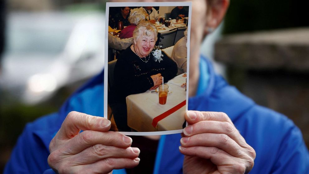 PHOTO: Pat Herrick holds up a picture of her mother Elaine Herick, 89, who passed away in the morning at the Life Care Center of Kirkland, a long-term care facility linked to several confirmed coronavirus cases, in Kirkland, Washington, March 5, 2020.