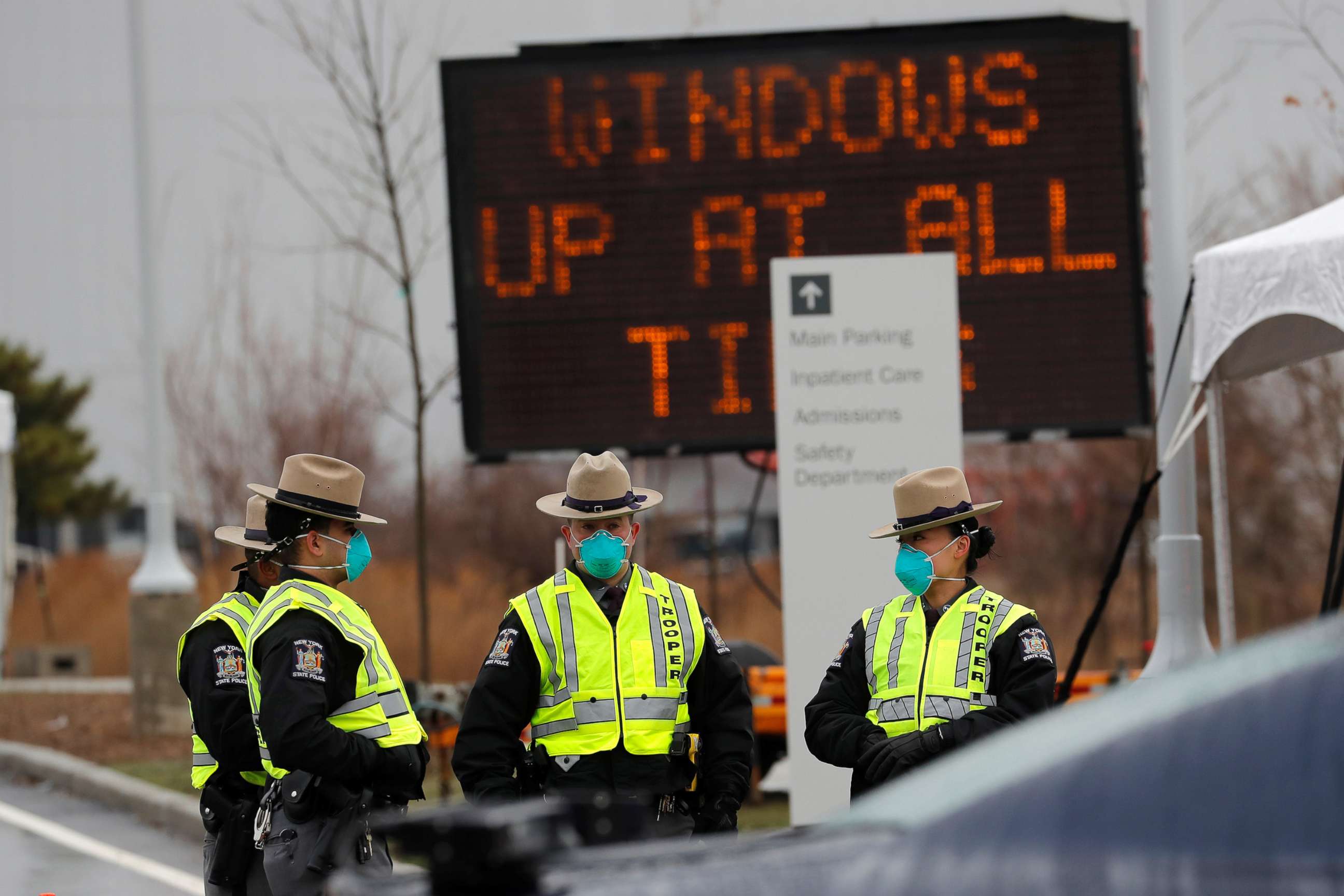 PHOTO: New York State Police officers stand outside a new coronavirus testing center in the Staten Island borough of New York City, March 19, 2020.