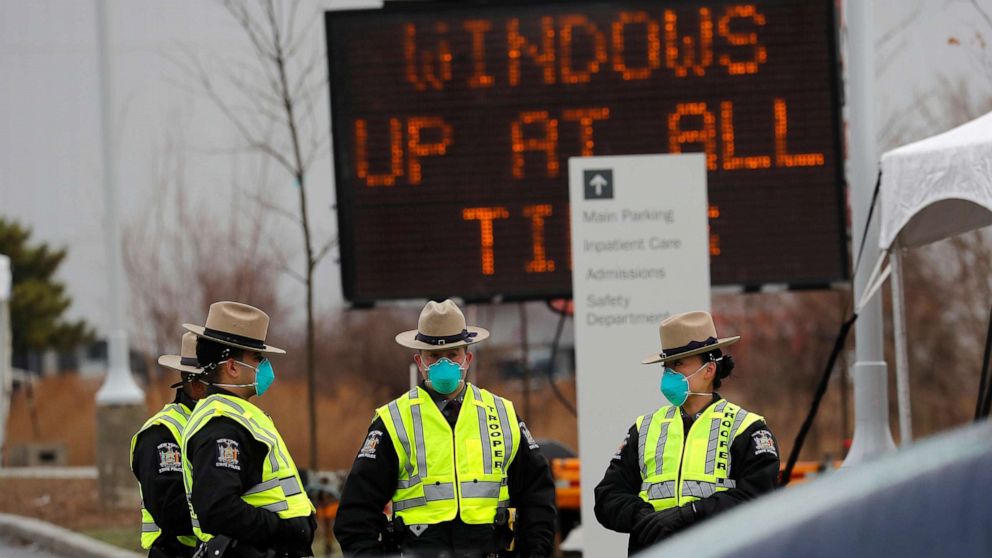 PHOTO: New York State Police officers stand outside a new coronavirus testing center in the Staten Island borough of New York City, March 19, 2020.