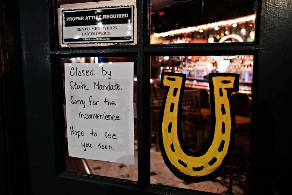 PHOTO: A restaurant posts a closed sign in the early evening in Brooklyn after a decree that all bars and restaurants shutdown by 8 pm, in New York City, on March 16, 2020, as much of the nation takes extra precautions due to the coronavirus outbreak.