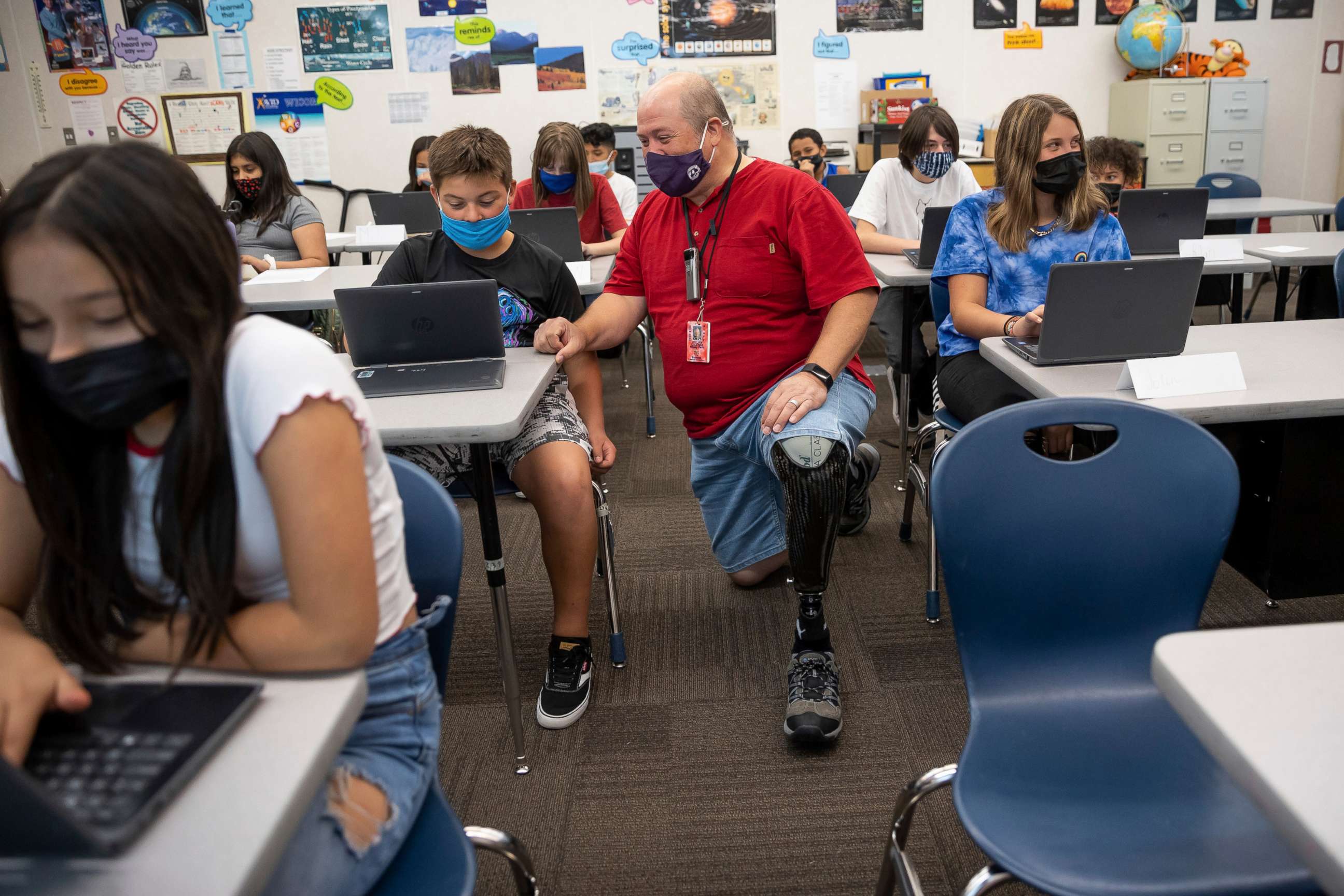 PHOTO: Bill Coleman, a sixth grade teacher, speaks with Jerry Oyler during class at Nibley Park School in Salt Lake City on Tuesday, Aug. 24, 2021.