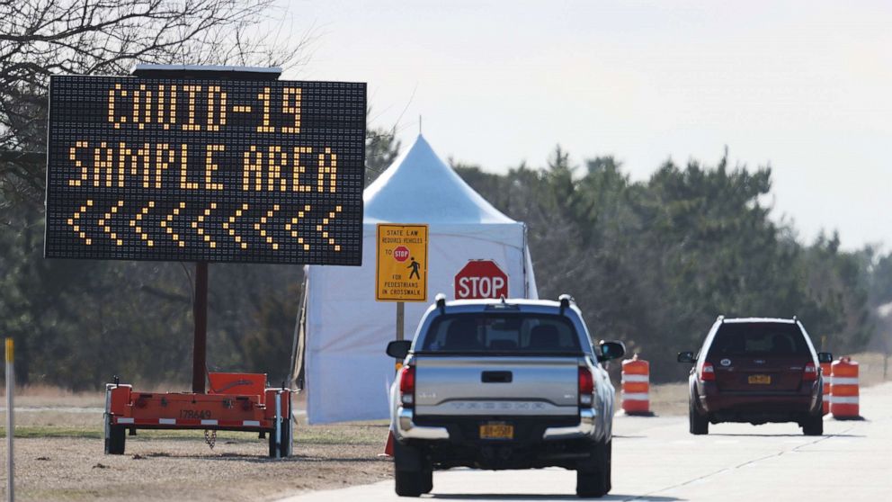 PHOTO: Cars arrive at a coronavirus drive-thru testing site at the Theodore Roosevelt Nature Center, on March 17, 2020, at Jones Beach State Park, New York.