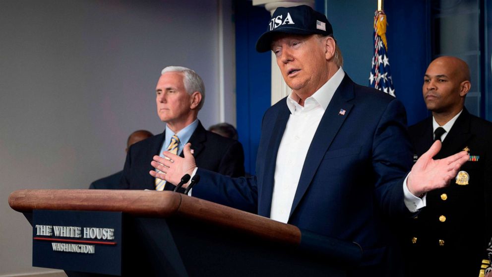 PHOTO: President Donald Trump speaks during a press briefing about the coronavirus alongside Vice President Mike Pence, left, and members of the Coronavirus Task Force in the Brady Press Briefing Room at the White House, in Washington, March 14, 2020. 