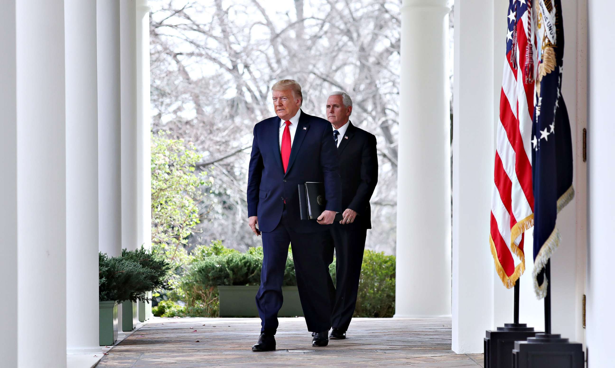 PHOTO: President Donald Trump arrives with Vice President Mike Pence to declare a national emergency due to the COVID-19 coronavirus pandemic, in the Rose Garden of the White House, in Washington, March 13, 2020.