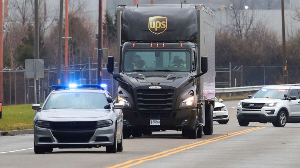 PHOTO: Kentucky State Police escort a UPS truck carrying Moderna's COVID-19 vaccine as it arrives at UPS Worldport, in Louisville, Dec. 20, 2020.