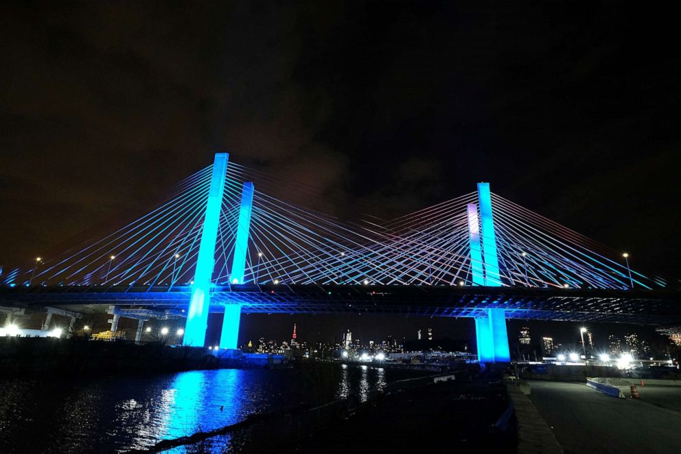 PHOTO: The Kosciuszko Bridge is illuminated in blue as part of the #LightItBlue for Health Workers movement on April 9, 2020 in New York City.
