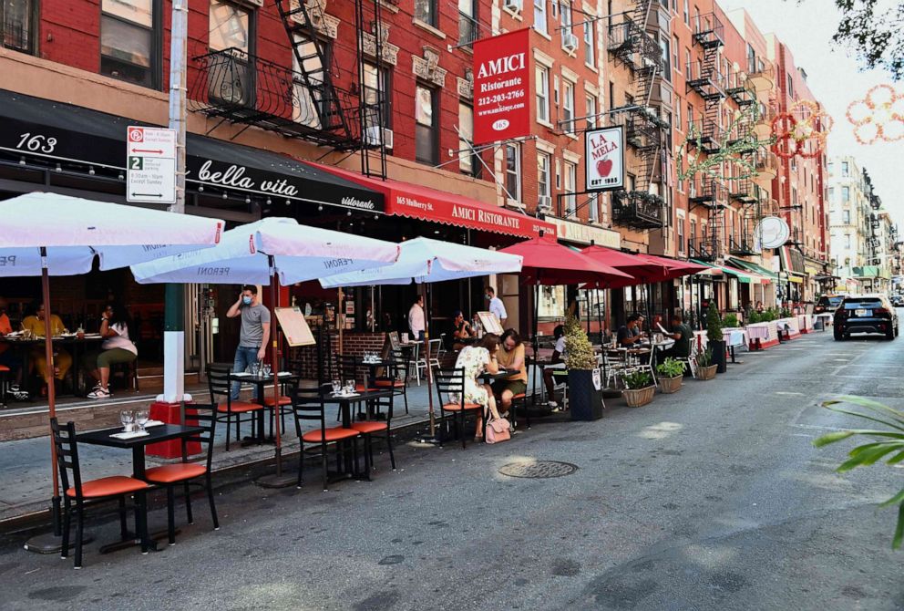 PHOTO: Tables for outdoor dining are set up outside a restaurant  in the Little Italy neighborhood on June 24, 2020 in New York City.