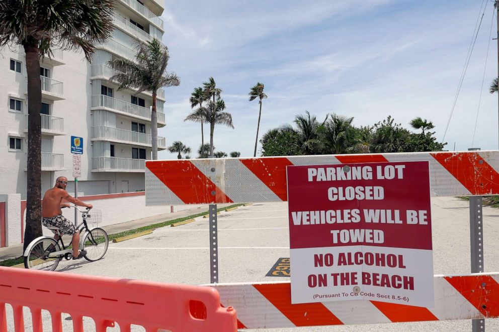 PHOTO: Although access to Cocoa Beach, Fla., was open to Florida residents on foot or bicycles, parking lots were closed to vehicles, April 23, 2020.