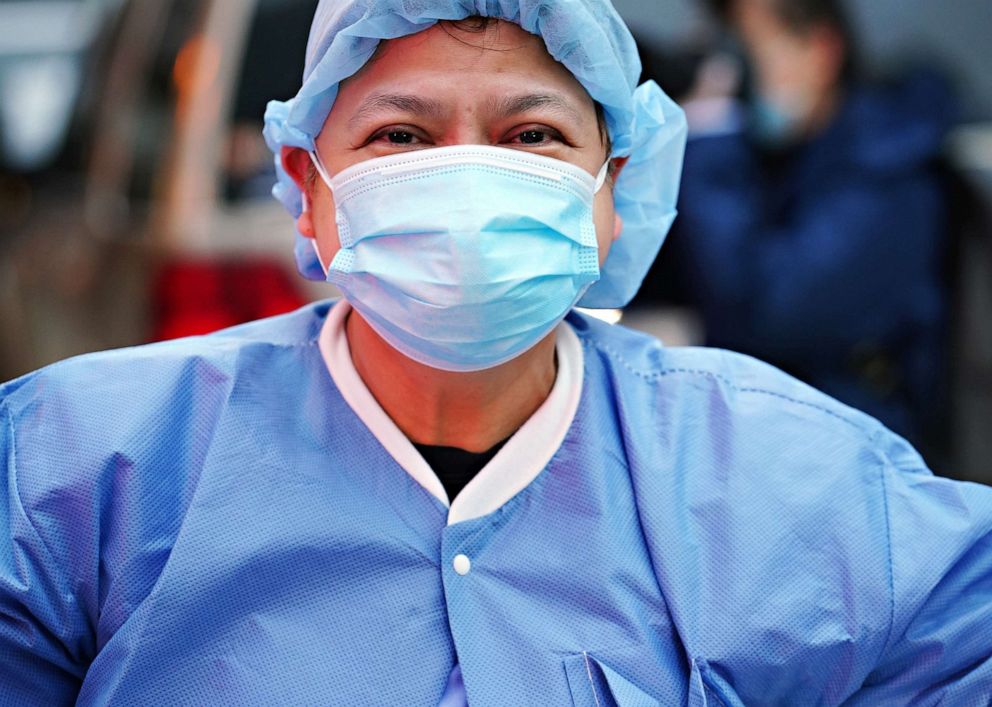 PHOTO: A medical worker poses for a photo outside Lenox Hill Hospital during the coronavirus pandemic on April 30, 2020 in New York City.