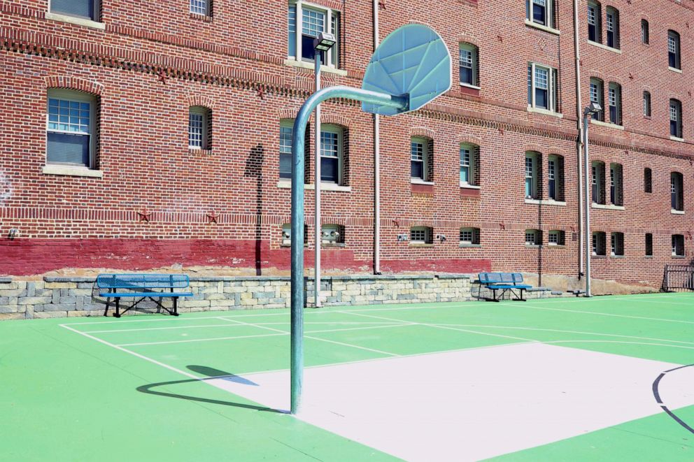 PHOTO: Basketball hoops are removed at a basketball court beside Marie Reed Elementary School following Mayor Muriel Bowser's state of emergency declaration due to the coronavirus disease, in Washington, D.C., April 16, 2020.