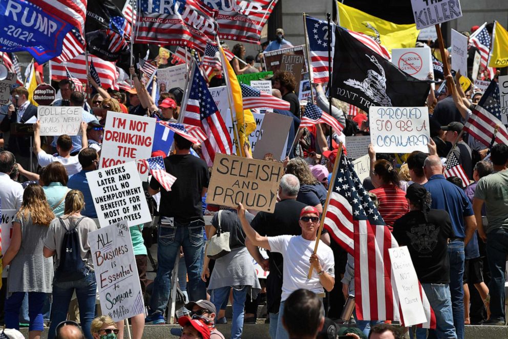 PHOTO: Demonstrators protest in Harrisburg, Pa., on May 15, 2020, demanding the re-opening of the state and against Governor Tom Wolf's shutdown orders during the coronavirus pandemic.