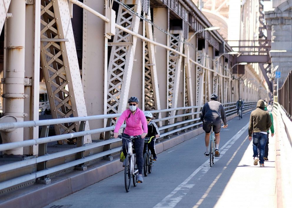 PHOTO: Cyclists ride on the Queensboro Bridge on May 13, 2020 in New York City.