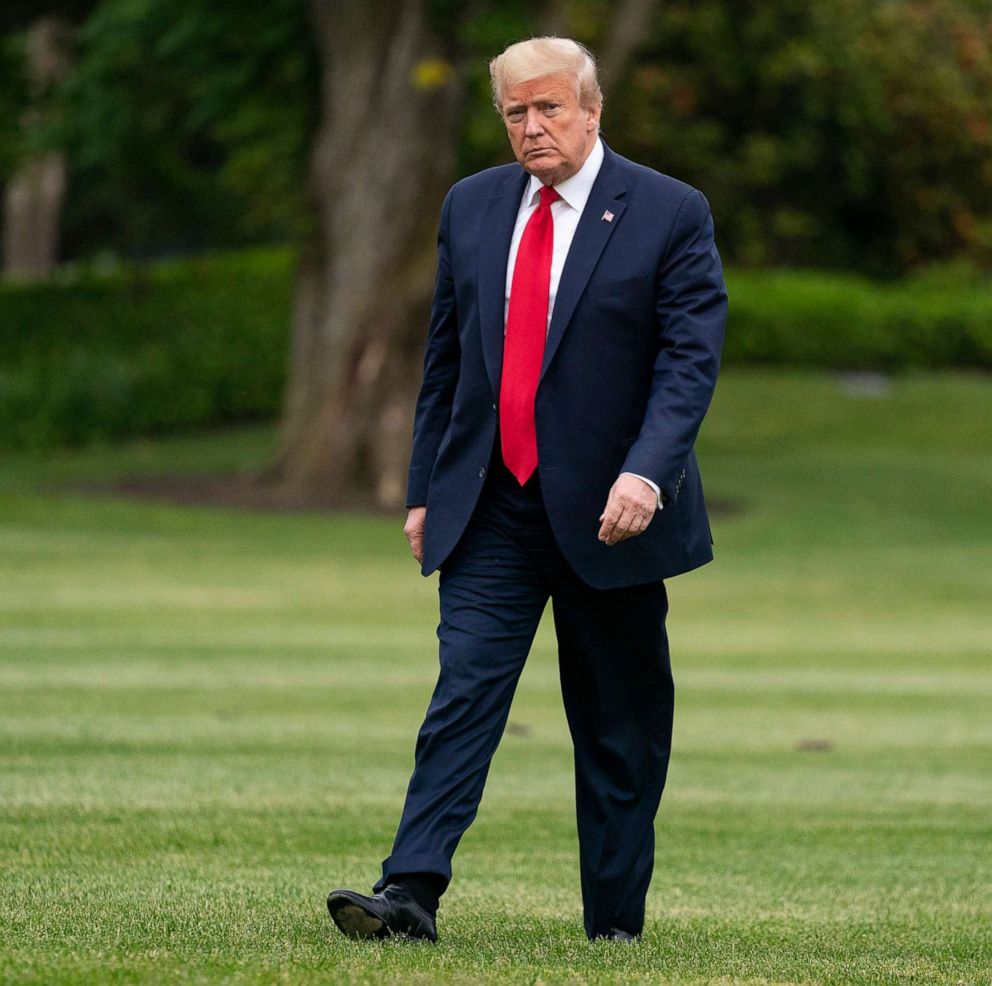 PHOTO: President Donald Trump arrives on the South Lawn of the White House after returning from a trip to Michigan, May 21, 2020, in Washington.