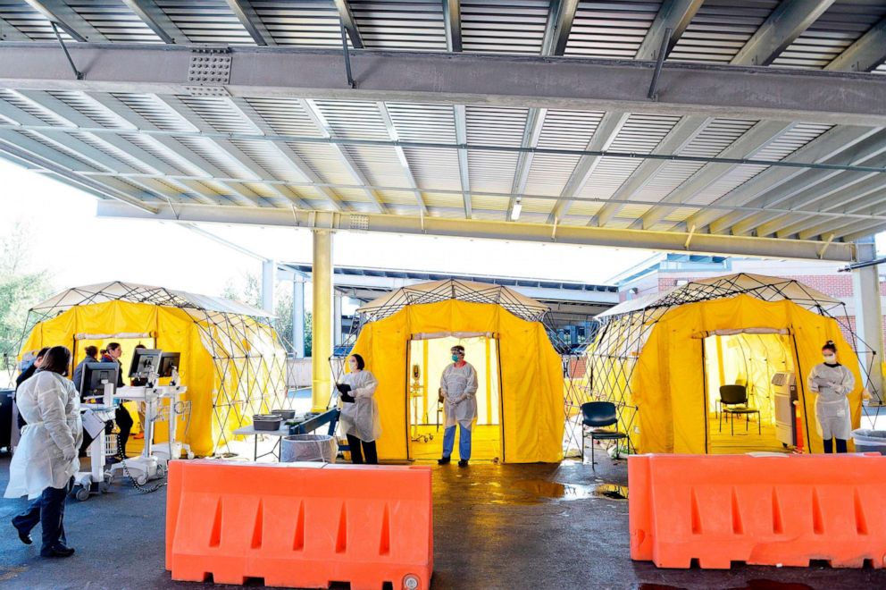 PHOTO: Hospital clinicians work to test patients for the coronavirus, Covid-19 at Newton-Wellesley Hospital in Newton, Mass., on March 18, 2020.