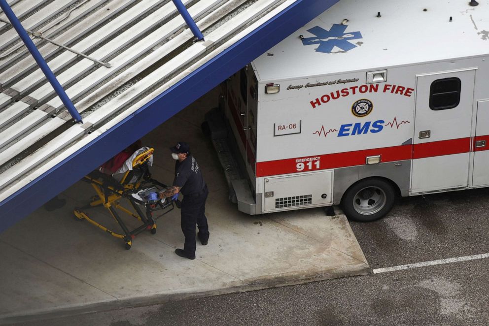 PHOTO:A patient is wheeled into Houston Methodist Hospital at the Texas Medical Center, amid the global outbreak of the coronavirus disease (COVID-19), in Houston, June 22, 2020.