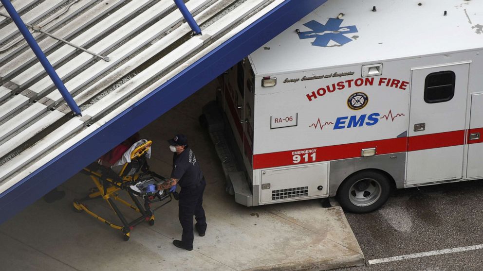 PHOTO: A patient is wheeled into Houston Methodist Hospital at the Texas Medical Center, amid the global outbreak of the coronavirus disease (COVID-19), in Houston, June 22, 2020.
