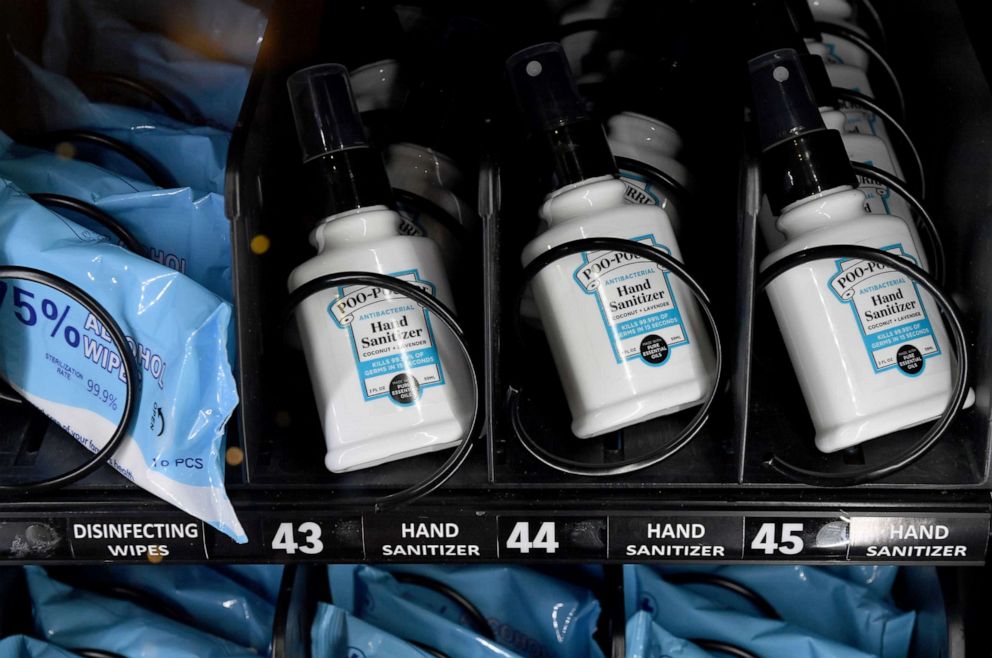 PHOTO: Alcohol disinfecting wipes and bottles of hand sanitizer are displayed in a personal protective equipment vending machine in the Terminal 1 ticketing area at McCarran International Airport on May 14, 2020 in Las Vegas.