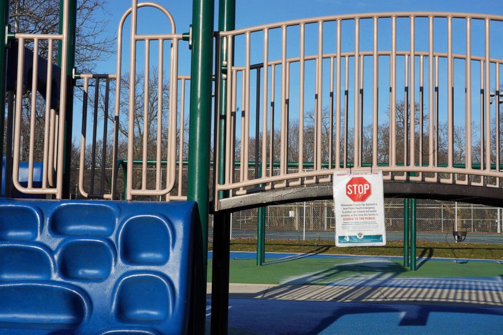 PHOTO: A sign notifies residents not to use the playground at Lake Park in Milwaukee, April 2, 2020.