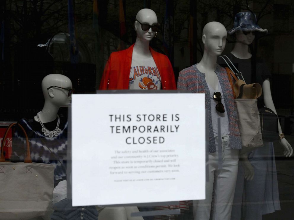 PHOTO: A window display and sign at a closed J.Crew store near Rockefeller Plaza in New York City on May 4, 2020.