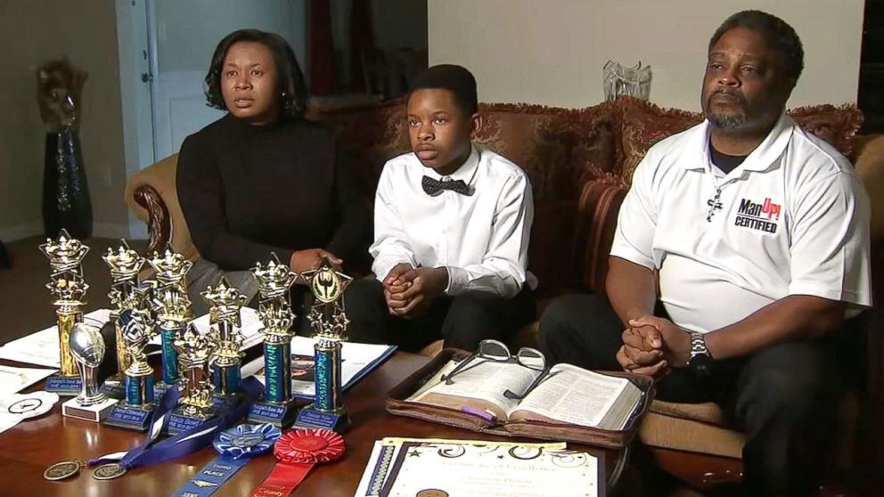 PHOTO:  Austin Philon, 12, an honor student at Austin Road Middle School in Stockbridge, Georgia, and his parents, Gwen and Earvin Philon, are appealing the10-day in-school suspension he got for unknowingly using a fake $20 bill to buy his school lunch. 
