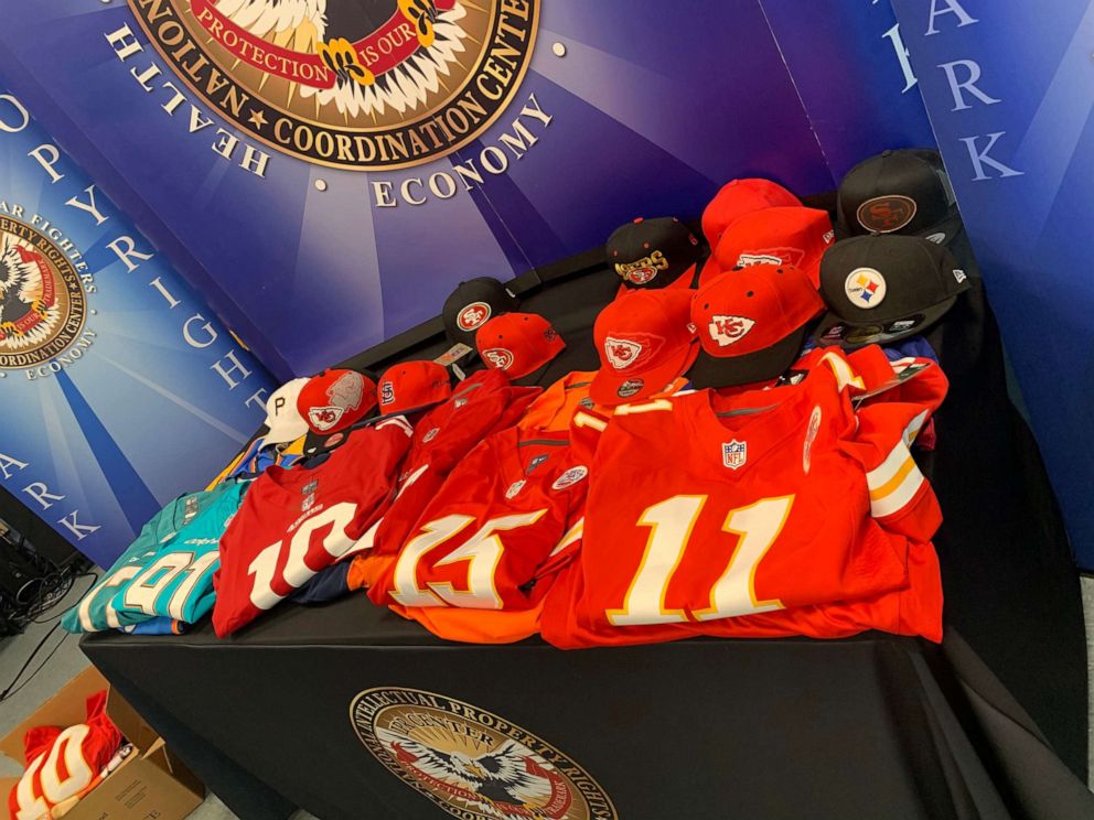 PHOTO: Homeland Security Investigations displays counterfeit goods seized in Miami ahead of Super Bowl LIV. 