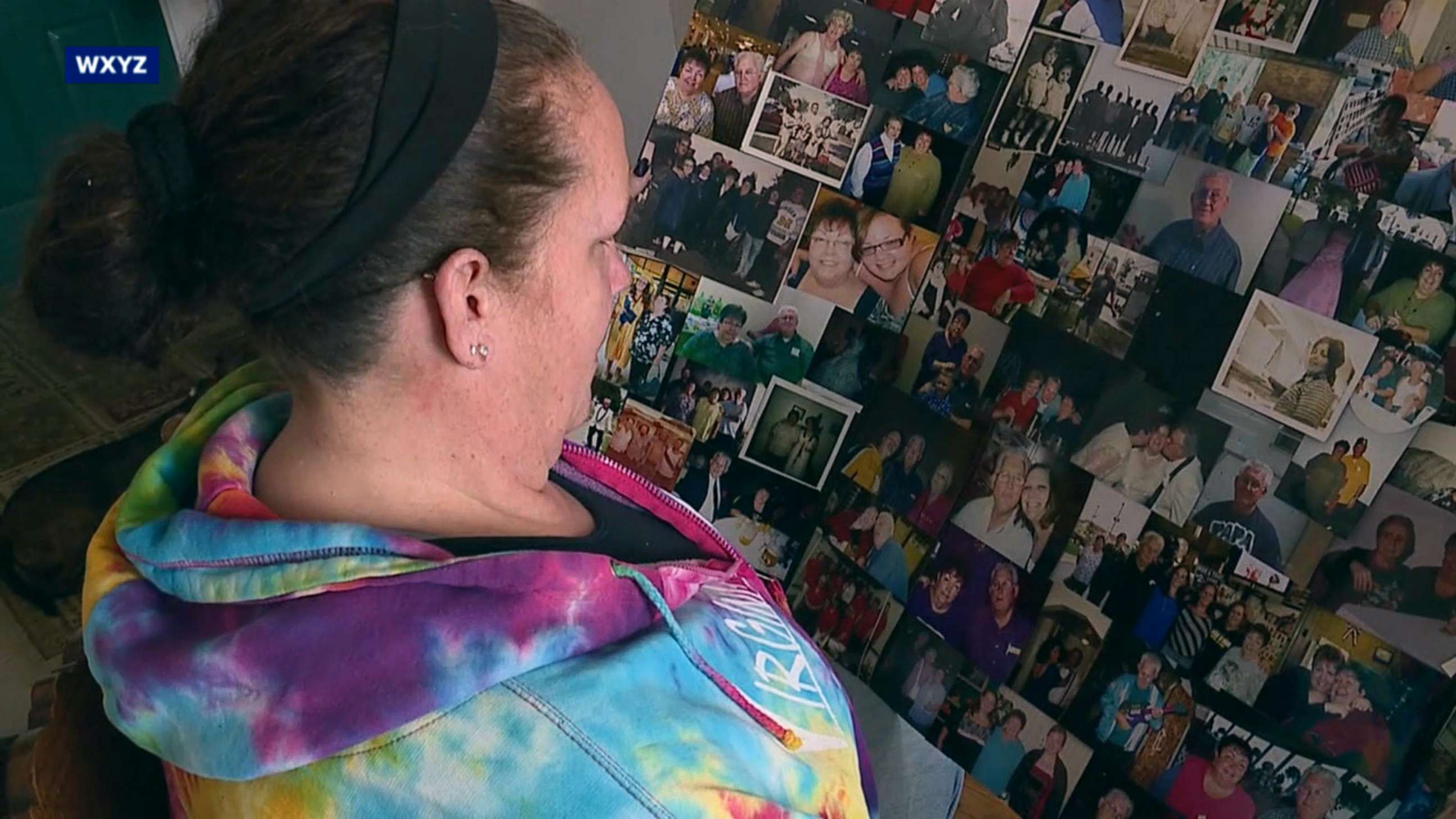 PHOTO: MaryBeth Webb looks at family photos of her parents, Judy and Will Webb,  married for 56 years before they died within hours of each other on March 6, 2019.
