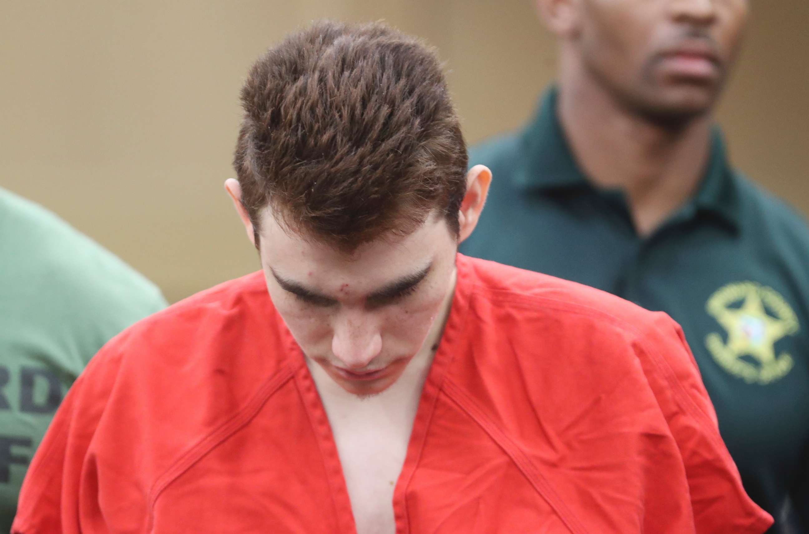 PHOTO: Nikolas Cruz is lead out of the courtroom after an arraignment hearing at the Broward County Courthouse in Fort Lauderdale, Fla., March 14, 2018.