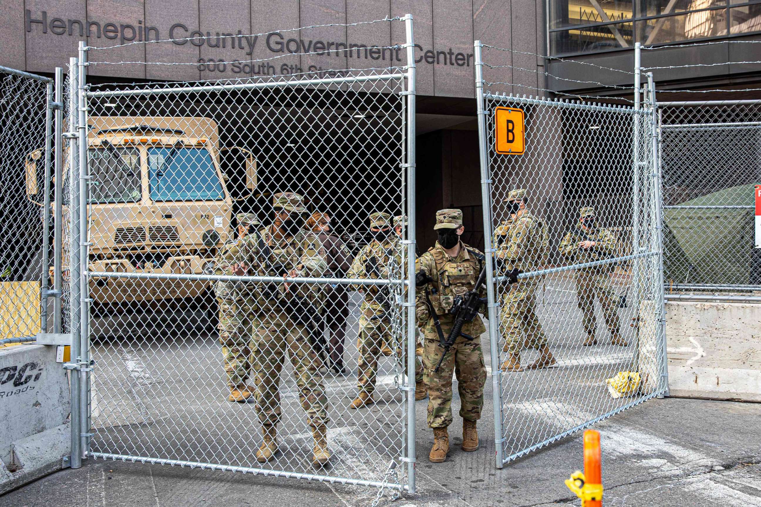 PHOTO: Members of the National Guard open the security gate outside the Hennepin County Government Center, March 9, 2021, in Minneapolis, during jury selection for the trial of former Minneapolis Police Department officer Derek Chauvin.