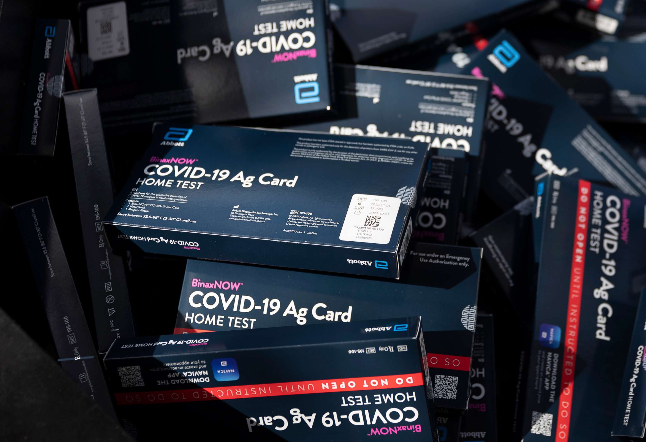 PHOTO: COVID-19 at-home rapid test kits are given away during a drive-thru event at the Hollywood library, Dec. 30, 2021, in Hollywood, Fla.