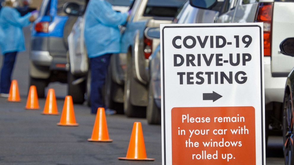 PHOTO: A "COVID-19 Drive-Up Testing" Sign.