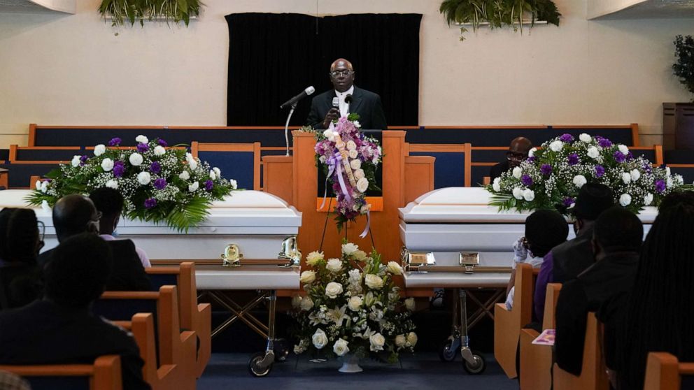 PHOTO: A Reverend speaks at a double funeral service for a mother and daughter who both died of coronavirus, at the Denley Drive Missionary Baptist church in Dallas, July 30, 2020.