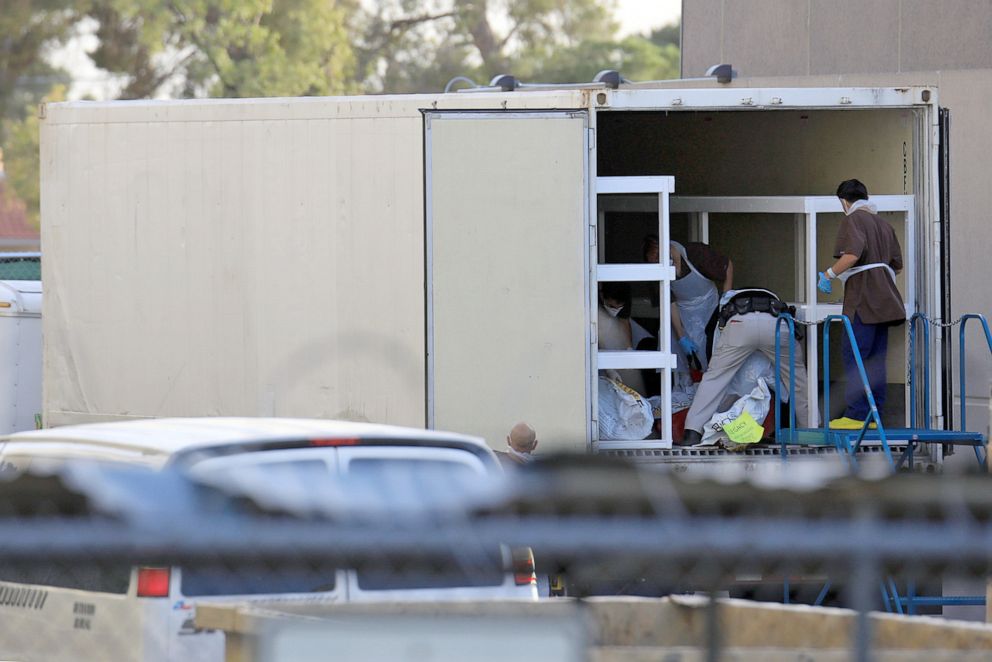PHOTO: Medical workers are seen in one of three refrigerated trailers, sent by the Federal Emergency Management Administration to help with the rising number of COVID-19 fatalities, in El Paso, Texas, Nov. 9, 2020.