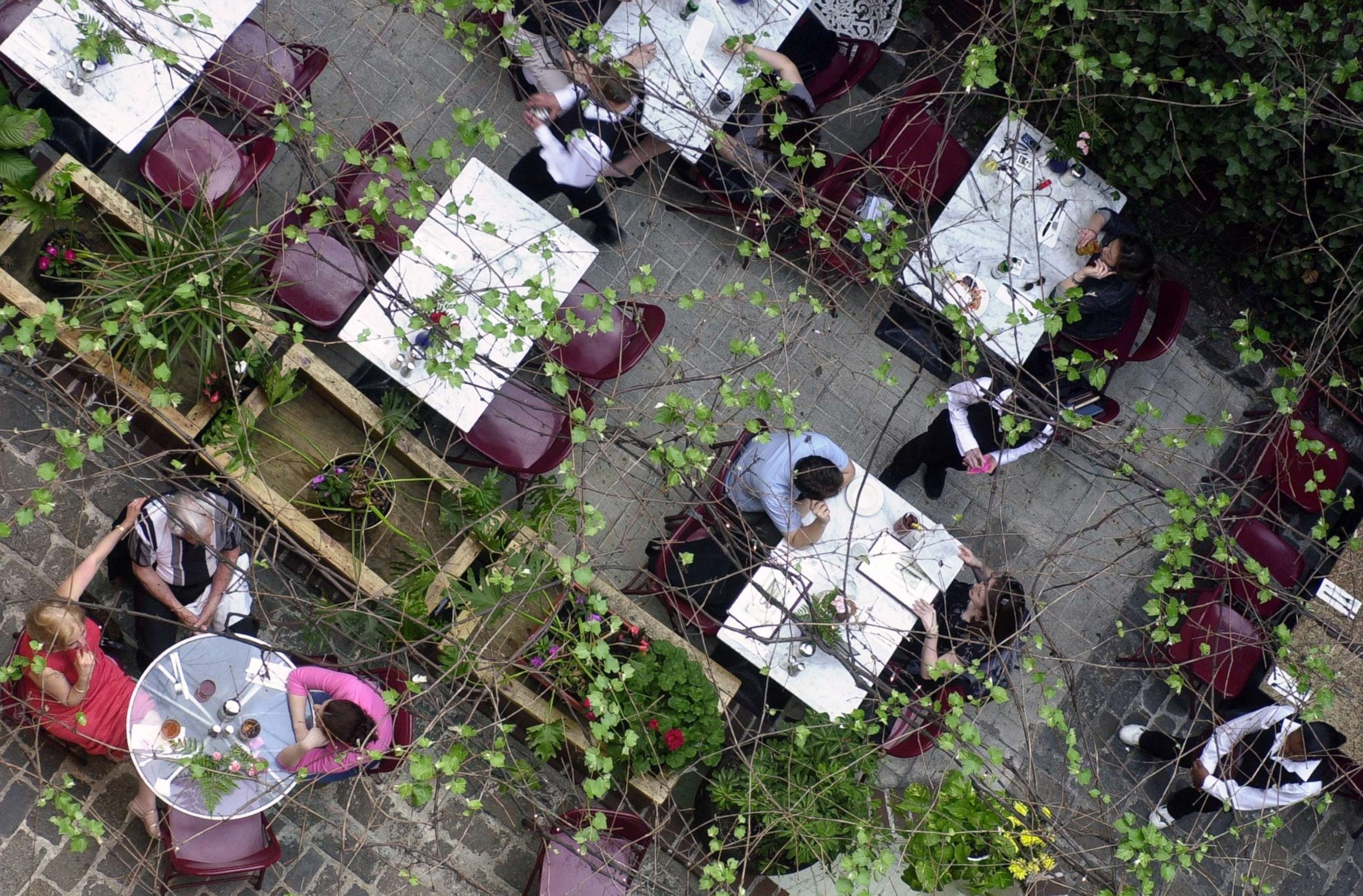 PHOTO: Patrons dine in the courtyard of the Cloister Cafe in the East Village of New York in an undated photo.