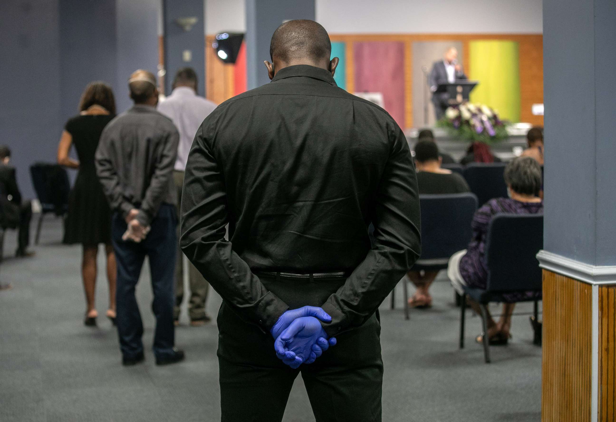 PHOTO: Friends and family members pay respects to Conrad Coleman Jr. during his funeral service on July 3, 2020 in New Rochelle, N.Y. Coleman, 39, died of COVID-19 on June 20, 2020, just over two months after his father also died of the disease.