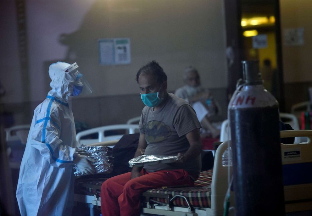 PHOTO: A view inside the temporary COVID Care Centre set up at Shehnai Banquet Hall attached to LNJP Hospital, April 25, 2021, in New Delhi.