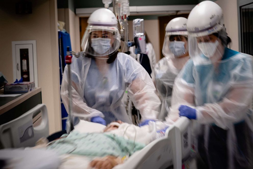 PHOTO: Health care workers transport a patient on a ventilator, with complications due to COVID-19, for a scan at Baxter Regional Medical Center in Mountain Home, Ark., July 8, 2021.