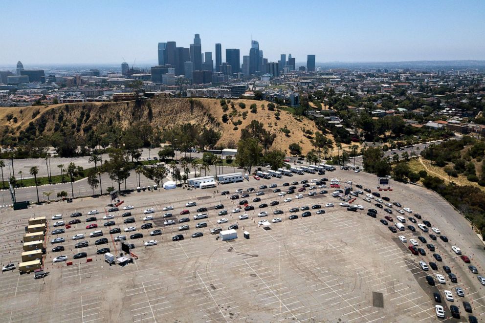 PHOTO: Motorists line up to take a coronavirus test at Dodger Stadium, July 16, 2020, in Los Angeles.