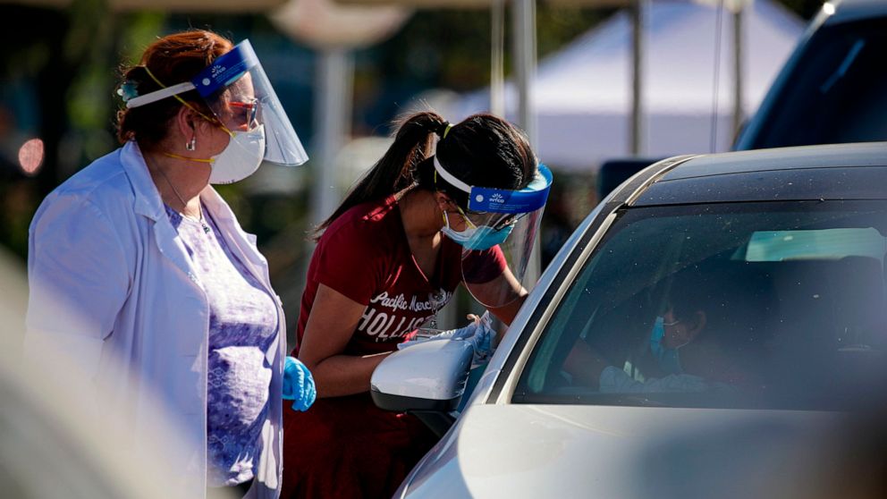 PHOTO: A mass vaccination of health care workers against COVID-19 takes place at Dodger Stadium in Los Angeles, California, on Jan. 15, 2021.