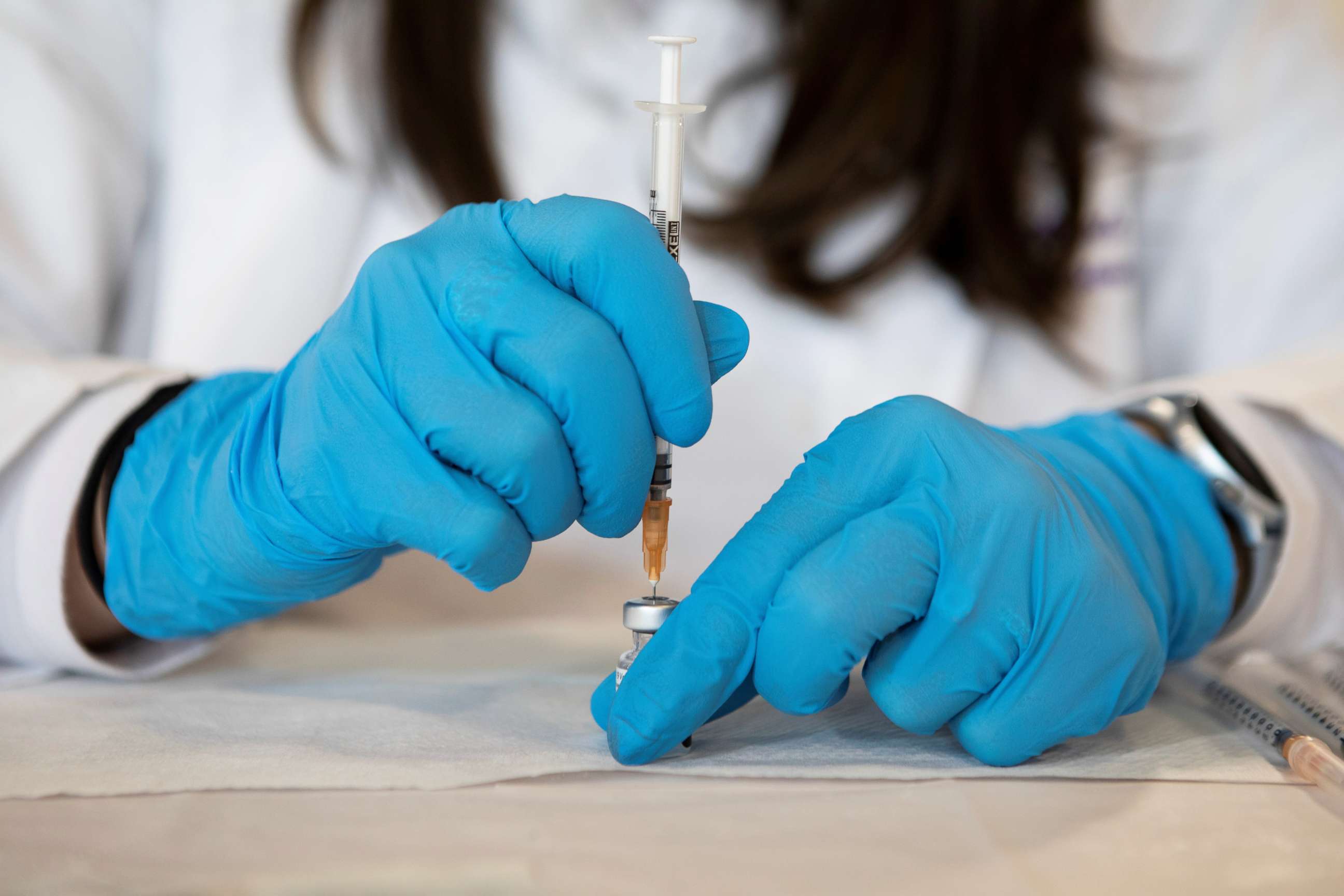 PHOTO: A nurse draws a dose of COVID-10 vaccine in Richmond, Va., March 4, 2021.
