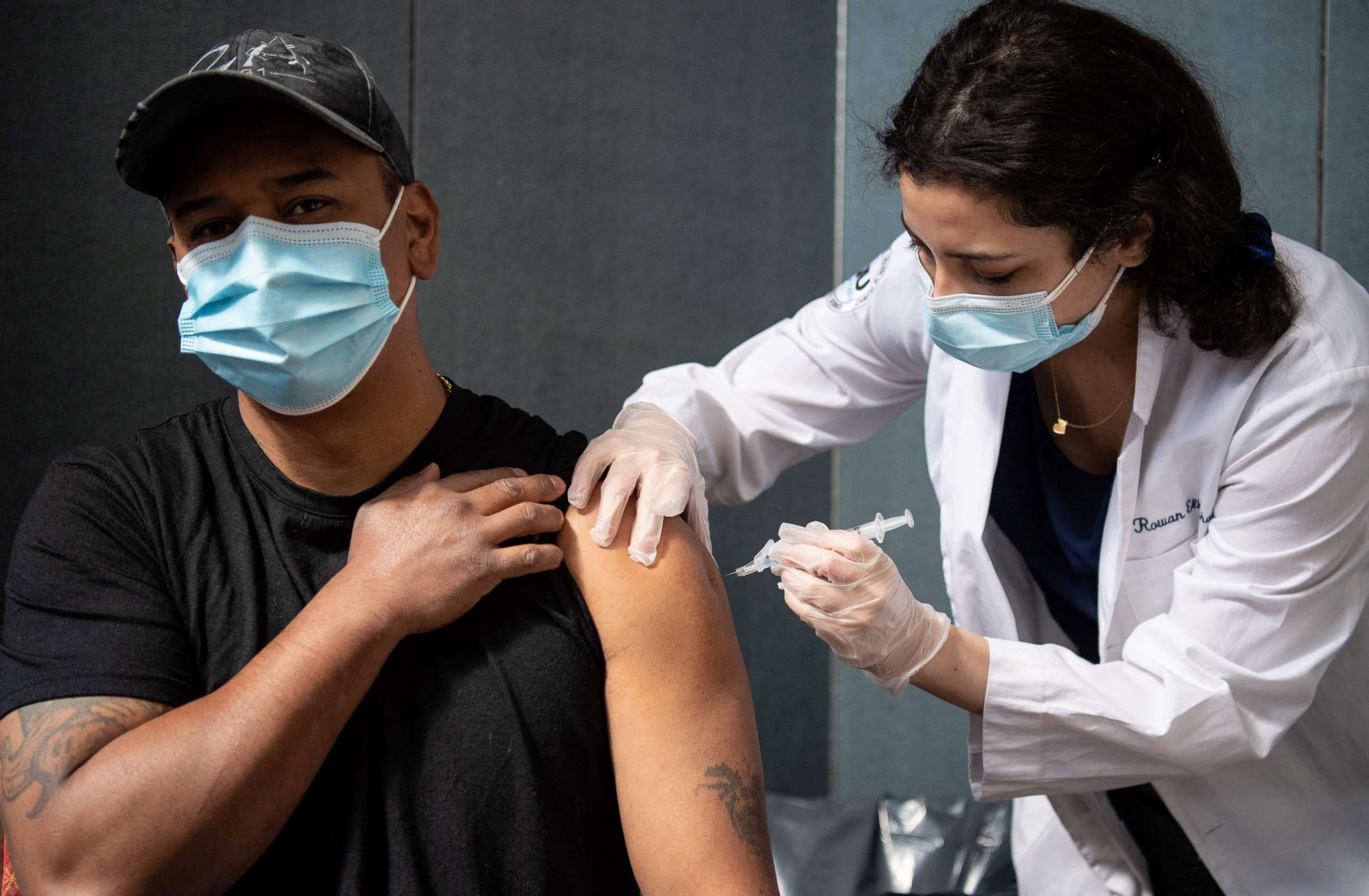 PHOTO: Javier Morena receives his first dose of the Moderna Covid-19 vaccine at the Jewish Community Center, a pop up vaccine clinic, April 16, 2021, in Staten Island, New York.