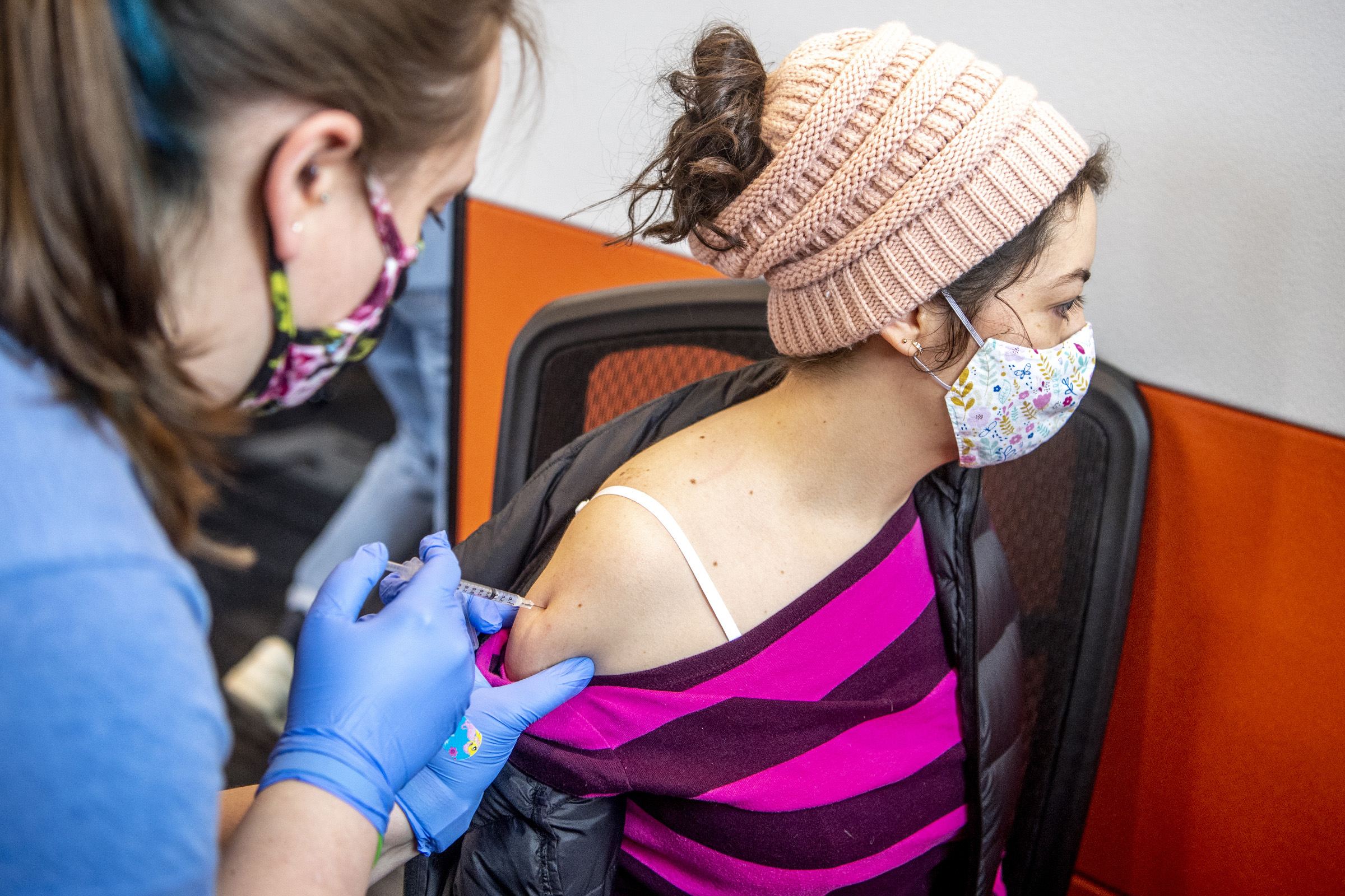 PHOTO: A nurse practitioner with Central Outreach Wellness Center, administers a dose of the COVID-19 vaccine to Valerie Reyes at a vaccine clinic hosted by Casa San Jose and the Pittsburgh Hispanic Development Corporation, April 17, 2021, in Pittsburgh.