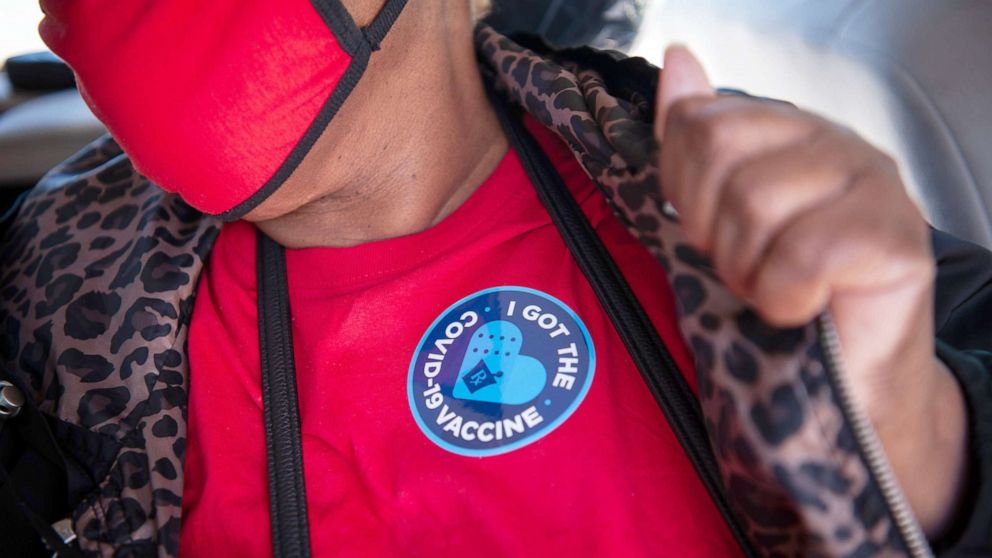 PHOTO: A person displays a sticker after receiving a dose of the Moderna Covid-19 vaccine at a medical clinic in Ruleville, Miss., March 4, 2021. 