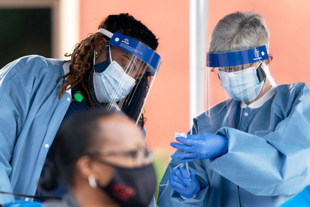 PHOTO: Nurses prepare a dose of the Pfizer-BioNTech COVID-19 vaccine in Savannah, Ga., Dec. 15. 2020.