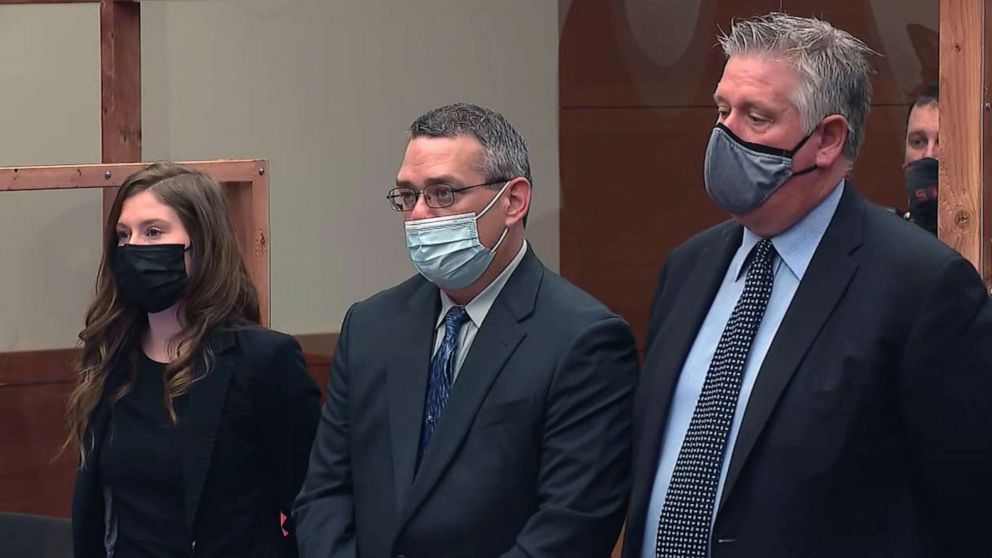 PHOTO: Fired Columbus police officer Adam Coy, center, appears in court, April 28, 2021, in connection with the shooting of Andre Hill in December 2020.