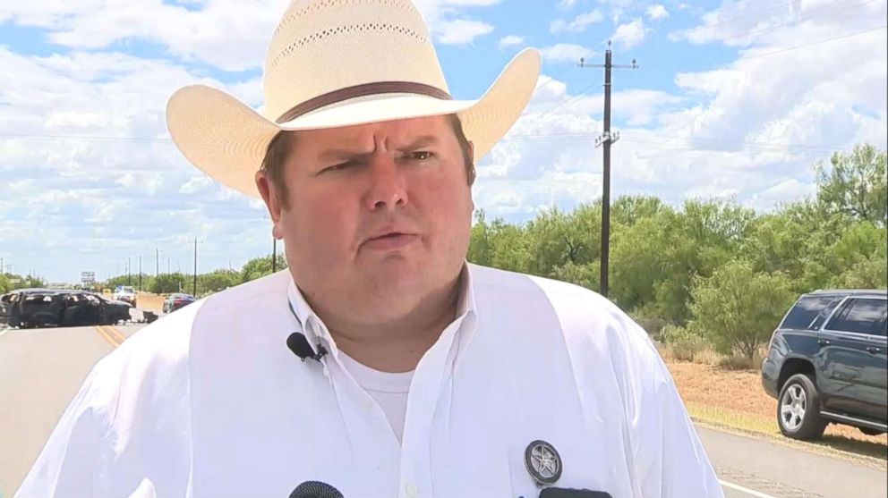 PHOTO: Demmet County Sheriff Marion Boyd speaks at the scene where five undocumented immigrants were killed when an SUV they were in crashed  near Big Wells, Texas, June 17, 2018.