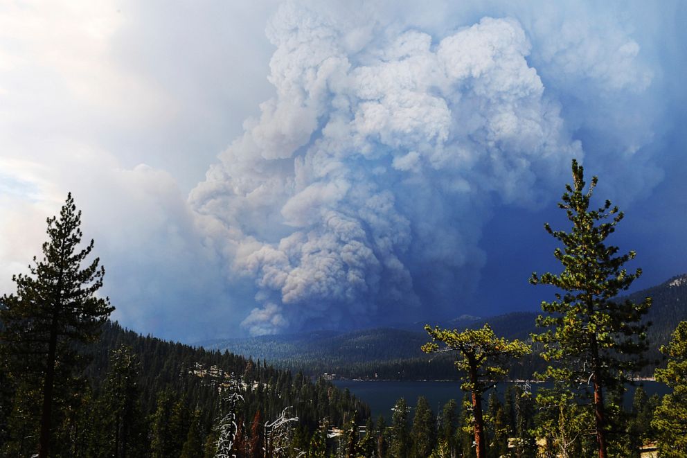 PHOTO: Huntington Lake is seen in the foreground as the Creek Fire burns in the distance, about 35 miles northeast of Fresno, California, on Sept. 5, 2020.