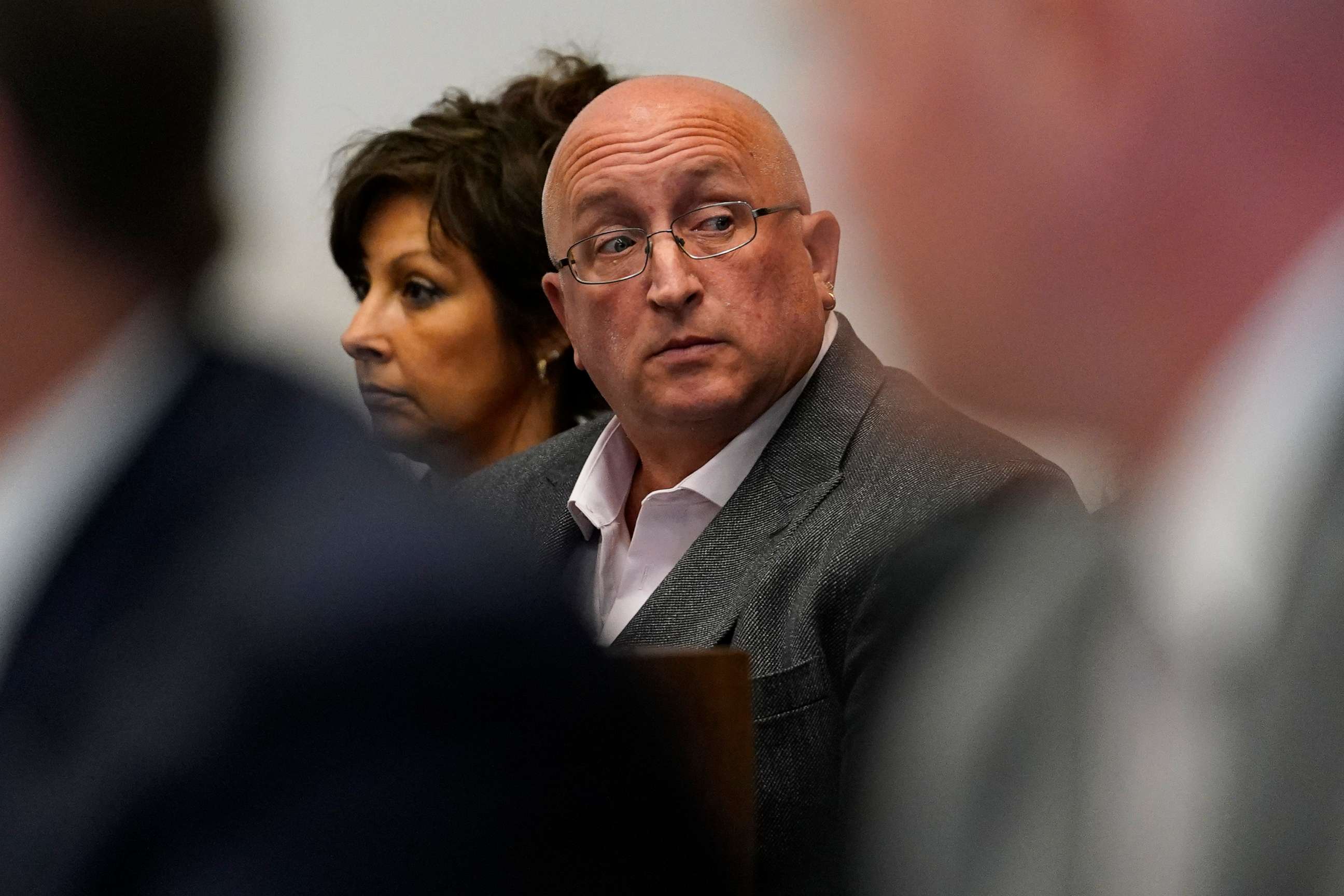 PHOTO: Robert E. Crimo III's father Robert Crimo Jr., right, and mother Denise Pesina attend to a hearing for their son in Lake County court on Aug. 3, 2022, in Waukegan, Ill.