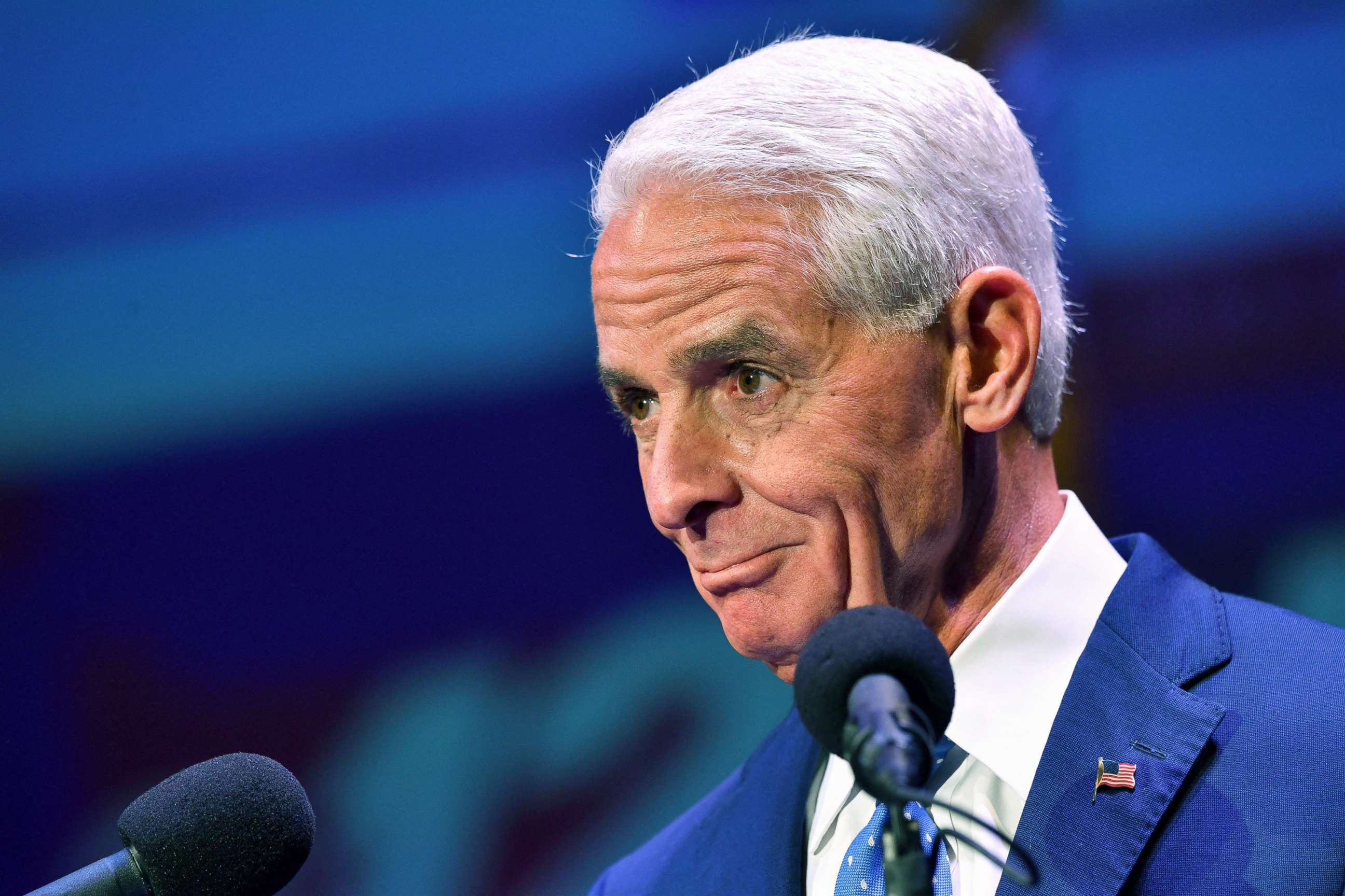 PHOTO: Democratic Party gubernatorial candidate Charlie Crist, a former governor, takes to the stage opposite Florida's Republican incumbent Gov. Ron DeSantis at the Sunrise Theatre in Fort Pierce, Fla., Oct. 24, 2022.